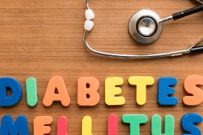 Diabetes mellitus spelled out in different coloured letters next to a stethoscope
